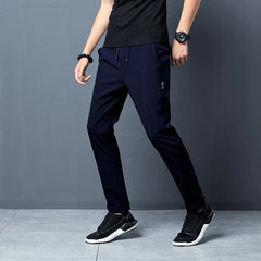 Summer men's casual pants slim fit thin Korean version ice silk pants Jinlun sports pants straight tube quick drying pants
